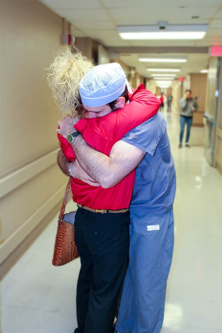 Mom and Dr. Catalani Hug - Regional One Health